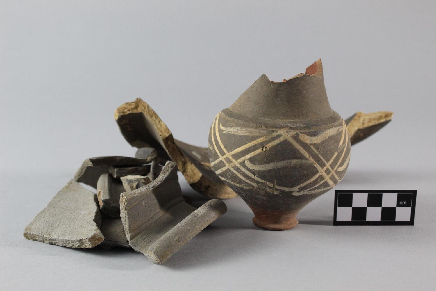 East Midlands Allied Press. Roman pottery found with burial during building works. PETMG:EMAP. Image: Peterborough Museum & Art Gallery