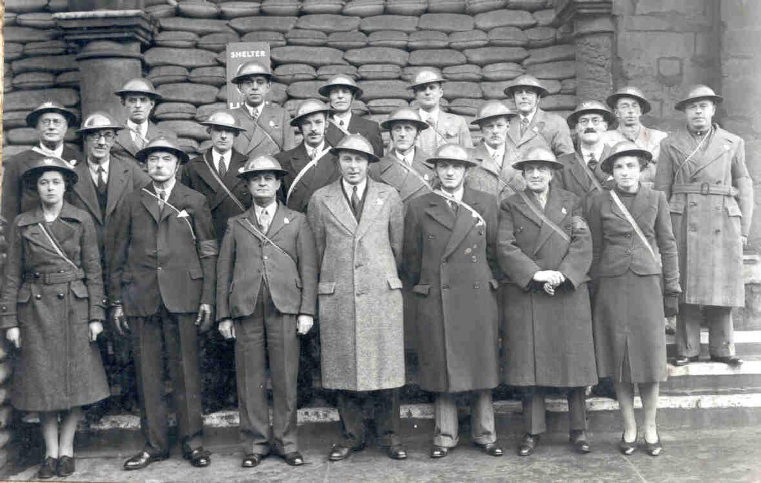 Civilian volunteers pose for a photograph outside of the Guild Hall, Peterborough