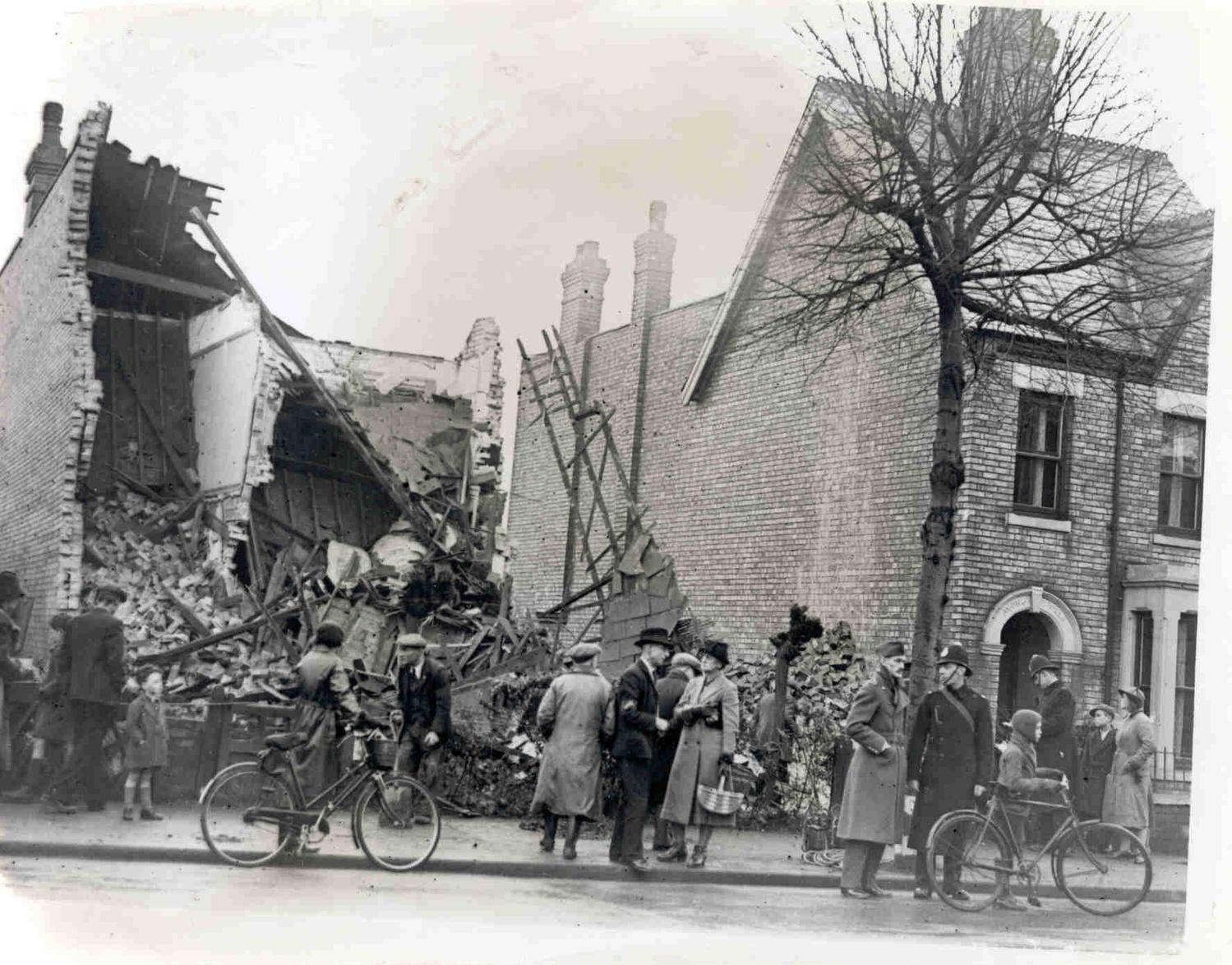 Photograph of a bomb damaged building at 67 London Road, Peterborough, 1940